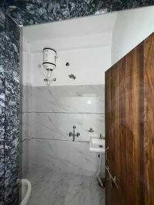 a bathroom with a sink and a toilet at Nahta's Farm Villa in Simrol