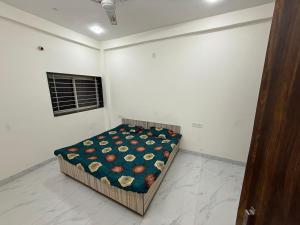 a bedroom with a bed in a room at Nahta's Farm Villa in Simrol