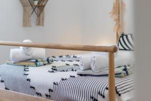 a bedroom with a bed with a wooden rail at Villa Carolima - Heated Pool in Benissa