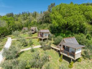 an overhead view of a house in a field at Glamping Le Ginestre in Monteverdi Marittimo