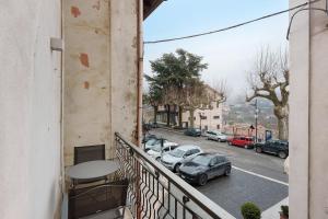 a balcony with cars parked in a parking lot at Casa Imperati in Agerola