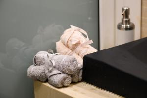a pile of stuffed animals sitting on top of a counter at Seaside House In Agios Vasilios in Patra +37 photos