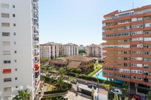 an aerial view of a city with buildings at Apartment Acapulco in Fuengirola