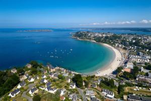 an aerial view of a beach and the ocean at Maison Gwel Kaer in Perros-Guirec