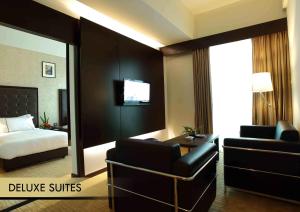Katil atau katil-katil dalam bilik di Symphony Suites Hotel