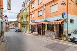 an empty street in a city with buildings at Hotel Da Concetta a Jerzu in Jerzu