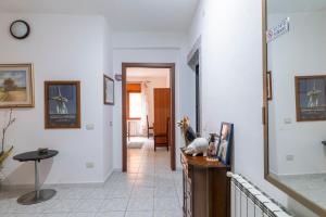 a hallway with a room with white walls and a hallway with at Hotel Da Concetta a Jerzu in Jerzu +62 photos