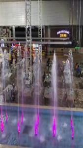 a group of water fountains in a shopping mall at Cirag Hotel Kurdemir in Kyurdamir