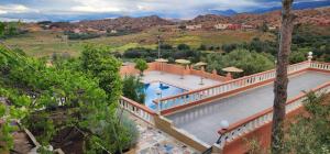 an aerial view of a house with a swimming pool at Green Valley Lodge - Atlas Mountains Nature in Taroudant