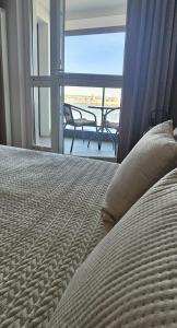 Llit o llits en una habitació de Nad Wisłą