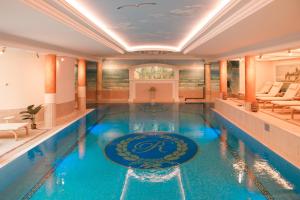 a pool in a house with a swimming pool at Rugard Thermal Strandhotel in Binz