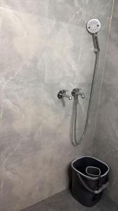 a shower in a bathroom with a toilet in a room at Moon Stays Newly Build I Couple Friendly I Panipat in Pānīpat +19 photos