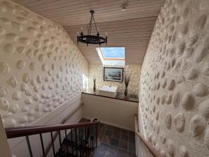 a staircase in a house with a wall at Kerry Ocean Lodge Room only in Glenbeigh +71 photos