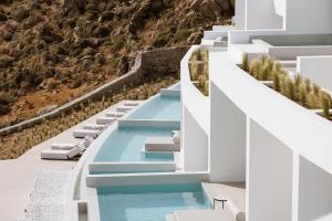 a rendering of a resort with two pools at Mykonos Flow Super Paradise, Adults Only by Mr and Mrs White in Super Paradise Beach