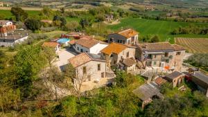 an aerial view of a village with houses at Valle in Fiore Suite - Private Jacuzzi & Sauna - ItalyWeGo in Ilci