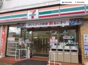 a store front of a store with signs on it at ura 東横のヨコ405 in Okayama