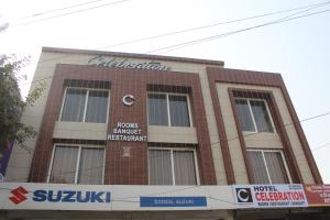 a building with a sign on the side of it at Hotel Celebration in Bharatpur