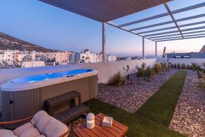 a hot tub on the roof of a house at Ether Rooftop Spa in Glyfada C47 in Athens