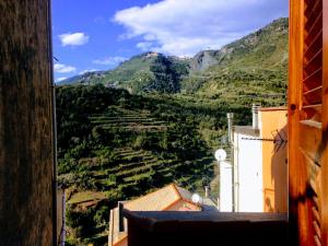 a view from a window of a mountain at La Scuna Apartments in Corniglia