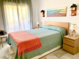 a bedroom with a bed and a window at Luxury Doña Carlota in Torremolinos +28 photos