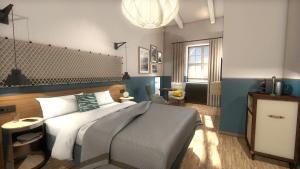 a bedroom with a large bed and a chandelier at HENRI Hotel Cuxhaven in Cuxhaven +4 photos