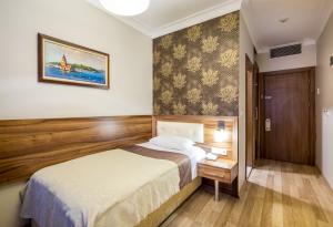 Postel nebo postele na pokoji v ubytování My Rose Hotel + 35 fotografií