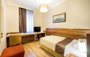 TV a/nebo společenská místnost v ubytování My Rose Hotel