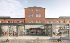 a rendering of a building with a brick building at HENRI Hotel Cuxhaven in Cuxhaven