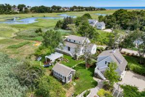 an aerial view of a house with a large yard at Marshside Cape Escape with Space Views in Sandwich