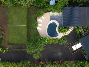 an overhead view of a swimming pool in a yard at Rolling Green Oasis in Fortuna