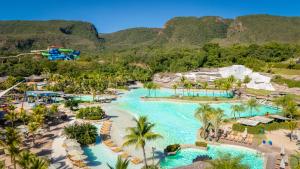 an aerial view of a water park at a resort at Rio Quente Resorts - Eco Chalés in Rio Quente