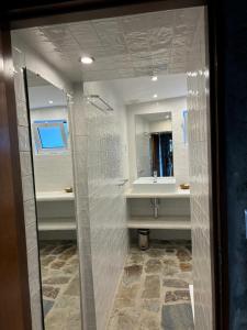a bathroom with two sinks and a mirror at CASA da PISCINA, Quinta do Espinho, Douro Valley in Tabuaço +29 photos