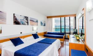 Ein Bett oder Betten in einem Zimmer der Unterkunft Gran Hotel Bali & Spa