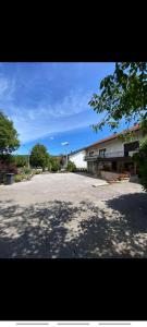 an empty parking lot in front of a building at Lavanda Lux in Drvar