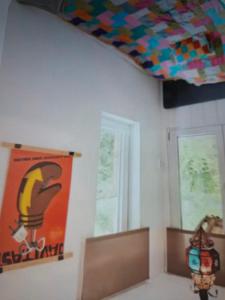 a room with a painting on the ceiling at Gomba Kert in Nagymaros
