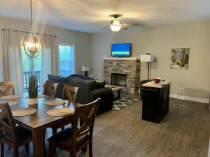 a living room with a couch and a table at Valhalla Resort Hotel in Helen