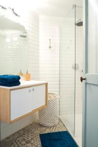 a bathroom with a shower and a sink at Malot 34 in Montreuil +50 photos
