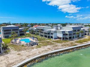 an aerial view of a resort on the beach at Mariner Pointe #521 in Sanibel