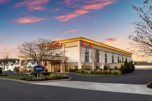 a rendering of a hotel with a stop sign in front at Hampton Inn Milledgeville in Milledgeville