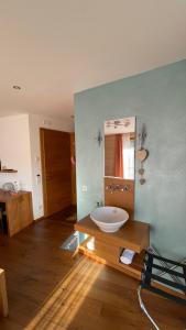 a bathroom with a sink and a mirror at Neumaier's Hotel in Biberach bei Offenburg +15 photos
