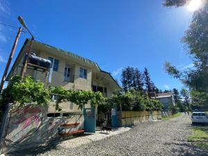 a dog standing in front of a building at TA-mari in Ureki +28 photos
