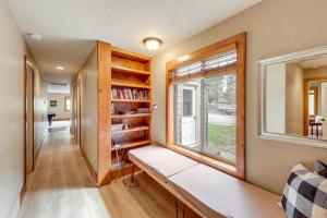 a room with a bench and a window at Columbia Falls Private Retreat: Pool Table & Deck! in Columbia Falls