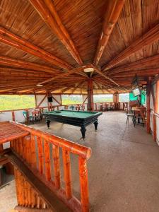 a large room with a pool table in it at Finca en La Cumbre in La Cumbre