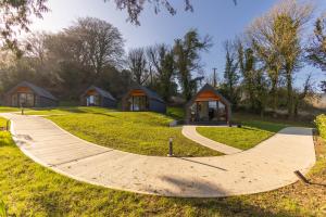 a skateboard ramp in a park with cottages at Narrow Water Lodges in Cornamucklagh +4 photos