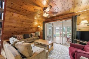 a living room with a couch and a table at Chalet #39 in Stevensville