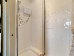 a bathroom with a shower with a glass door at 2 Bed in Wincle oc-pk298 in Windley +16 photos
