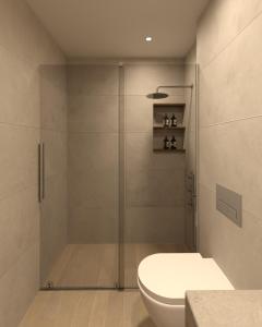 a bathroom with a shower with a toilet and a sink at NOEMA Fanari in Fanari +16 photos