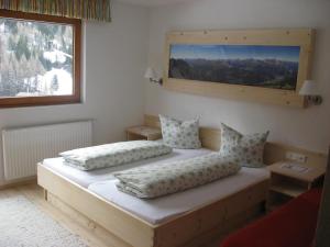 Posteľ alebo postele v izbe v ubytovaní Alpenrose-Apart