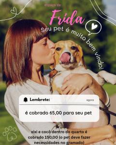 a woman kissing a dog on a flyer at next to UNISC in Santa Cruz do Sul