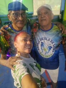 a group of three people posing for a picture at Quintal da Gra in Araruama +3 photos